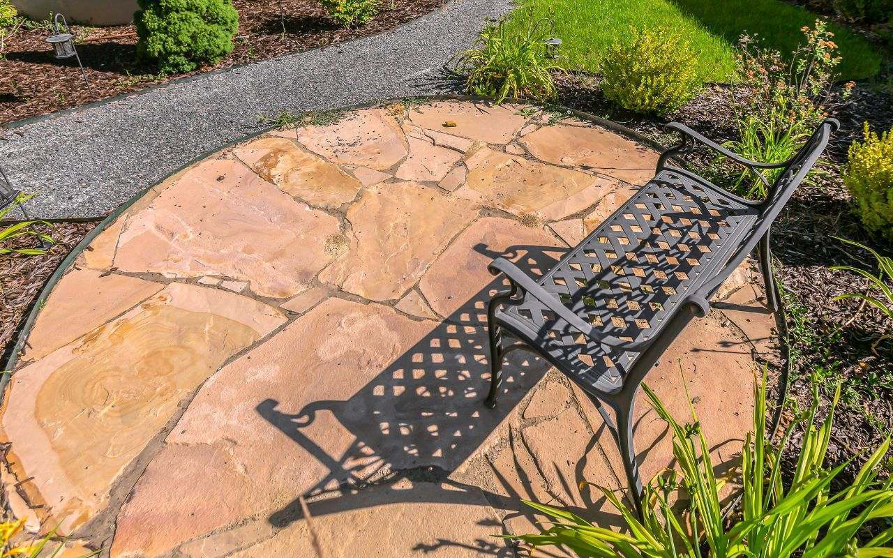 Rustic natural flagstone patio in Kitsap County landscape.